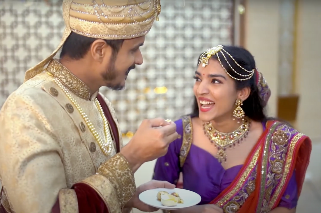 Bride and groom enjoying a heartfelt laugh at their wedding hosted by Dadu's